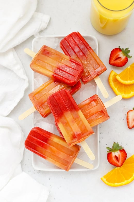 Strawberry-Orange-Sunrise-Popsicles-Emily-One-Lovely-Life